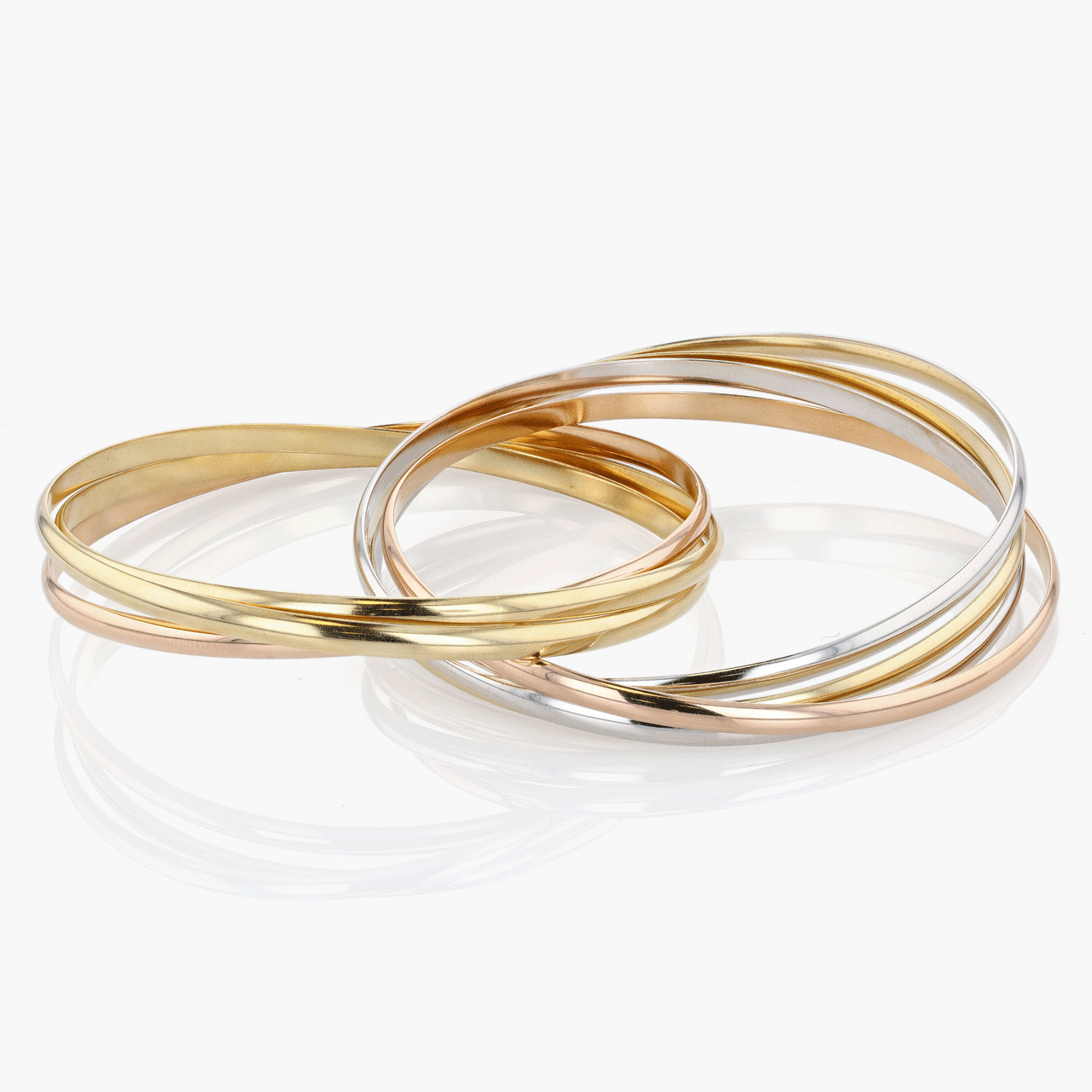 Gold, White Gold, and Rose Gold Seven Row Cartier Trinity Bangle