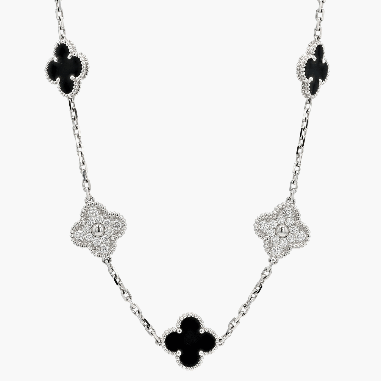 Van Cleef & Arpels White Gold, Diamond, and Onyx Alhambra 20 Motif