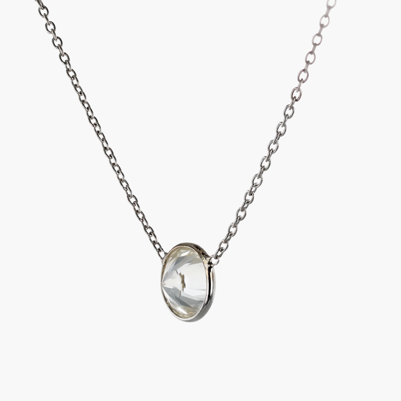 White Gold and Bezel Set Diamond Pendant