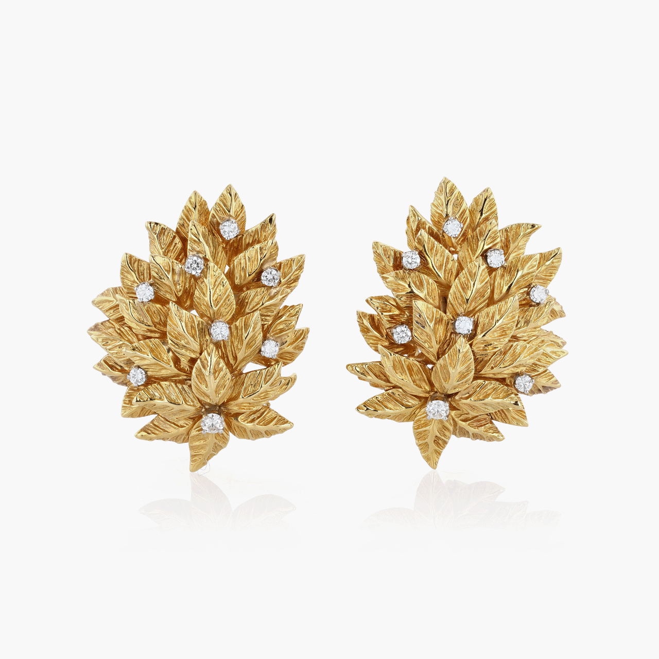 Gold and Diamond Earclips of Leaf Form