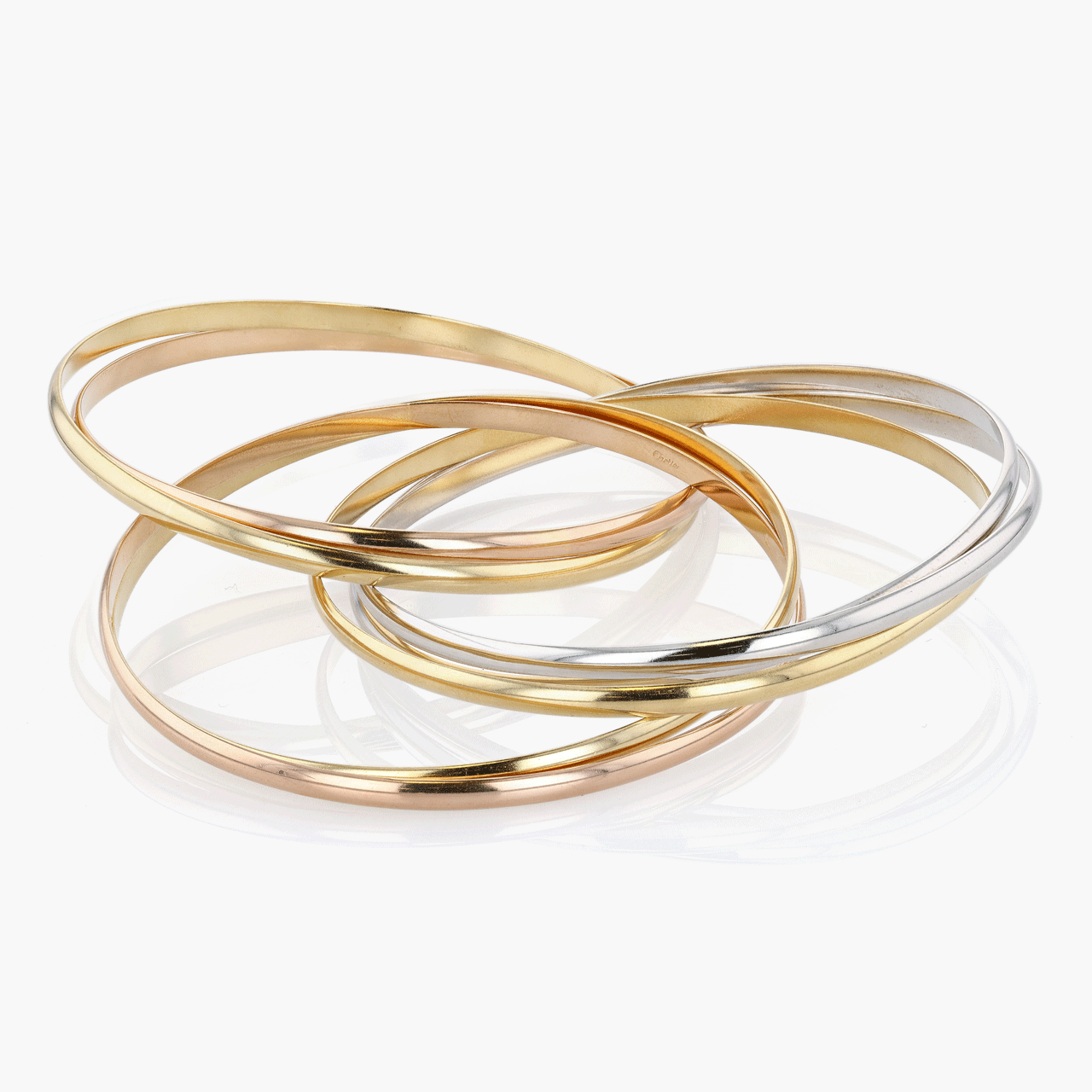 Gold, White Gold, and Rose Gold Seven Row Cartier Trinity Bangle
