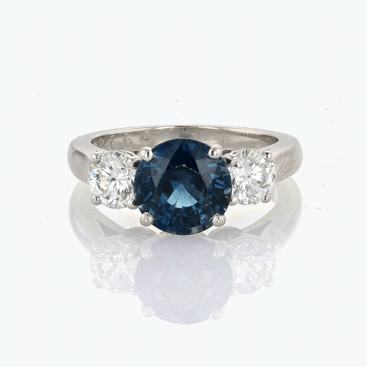 Platinum, Sapphire, and Diamond Three Stone Ring