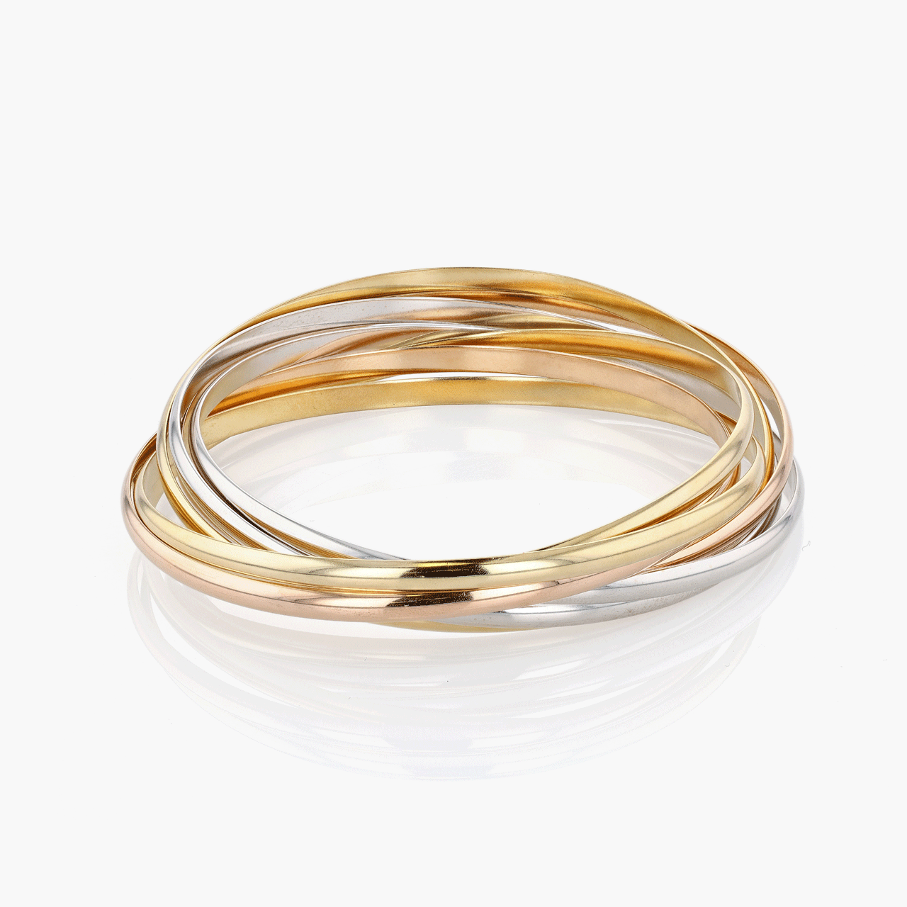 Gold, White Gold, and Rose Gold Seven Row Cartier Trinity Bangle