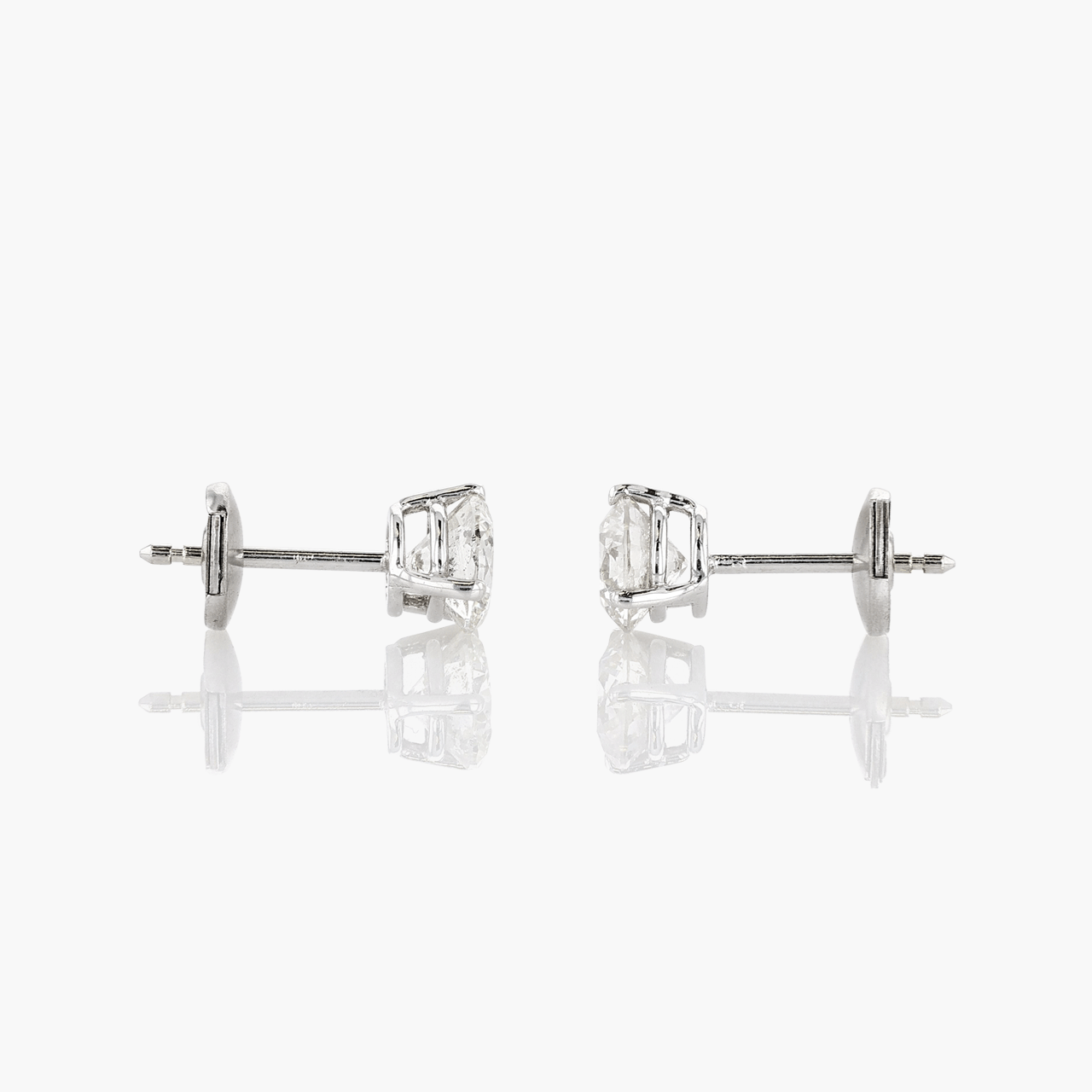 18k White Gold and 1.25 Total Weight Diamond Studs