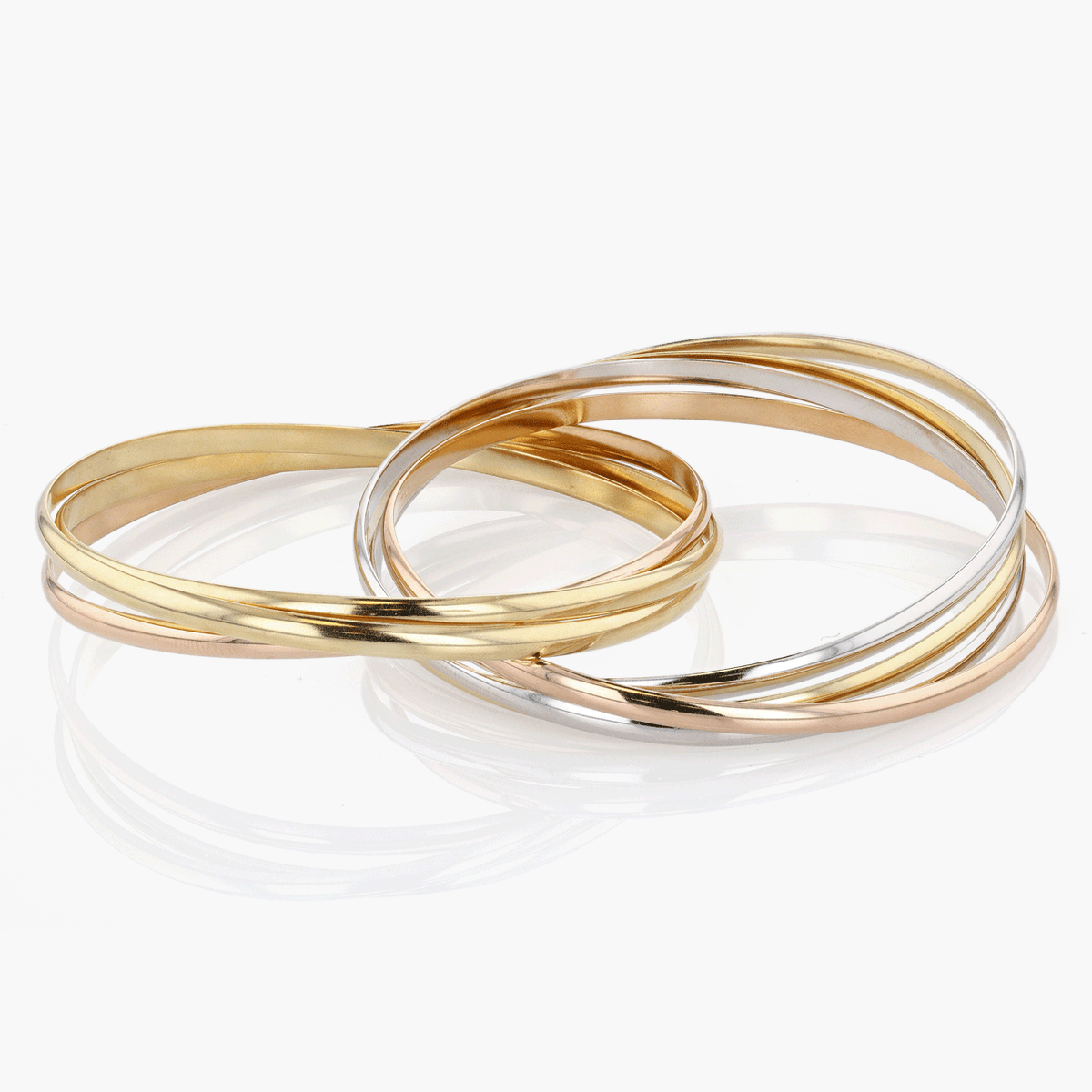 Gold, White Gold, and Rose Gold Seven Row Cartier Trinity Bangle