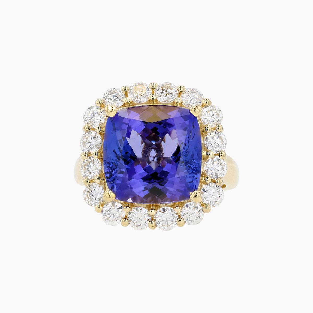 Vintage 18KT Gold Tanzanite and Diamond Halo Ring