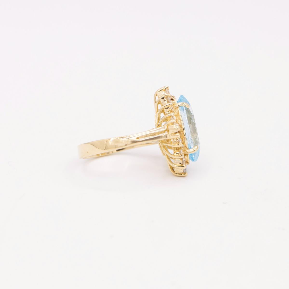 14KT Gold Blue Topaz and Diamond Ring