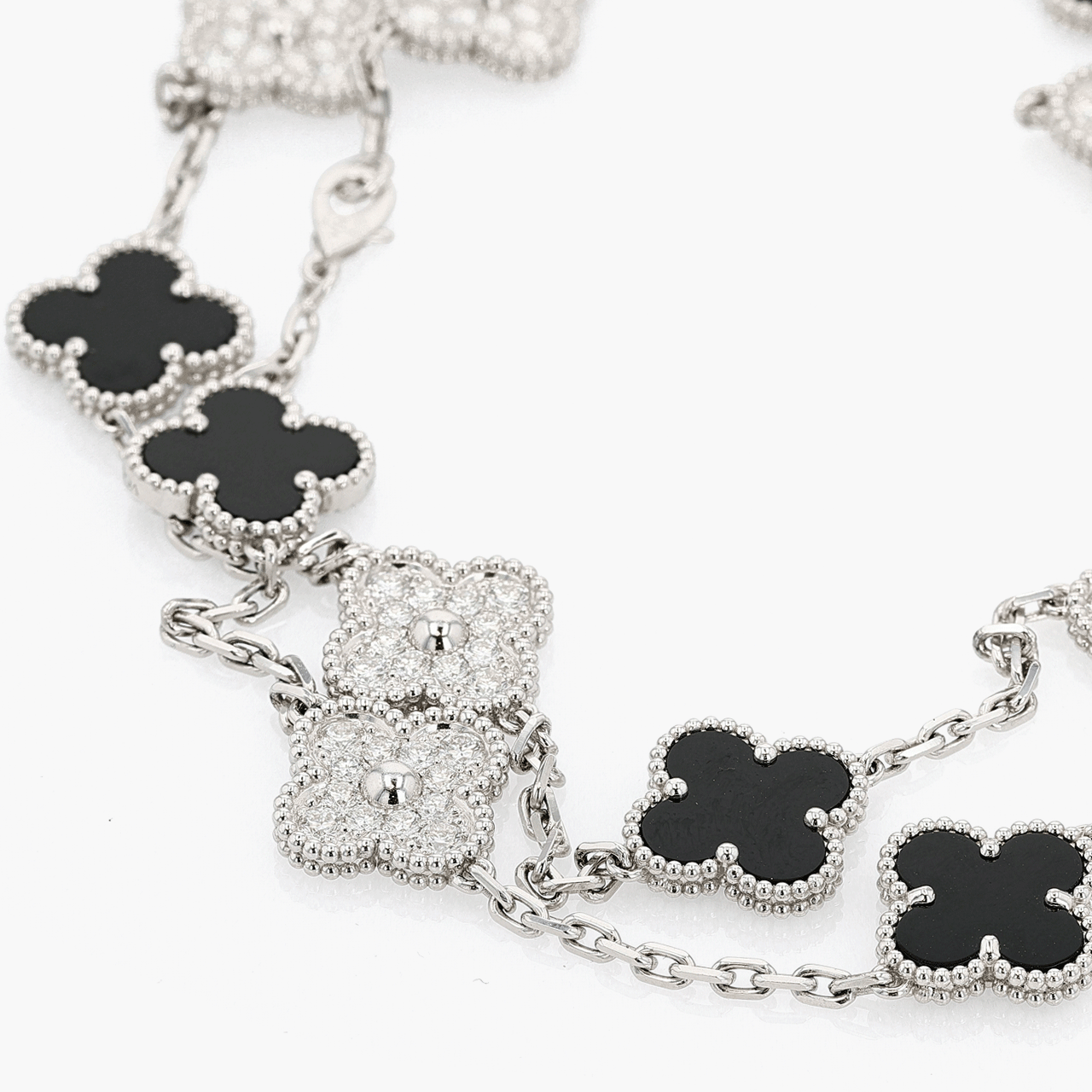 Van Cleef & Arpels White Gold, Diamond, and Onyx Alhambra 20 Motif