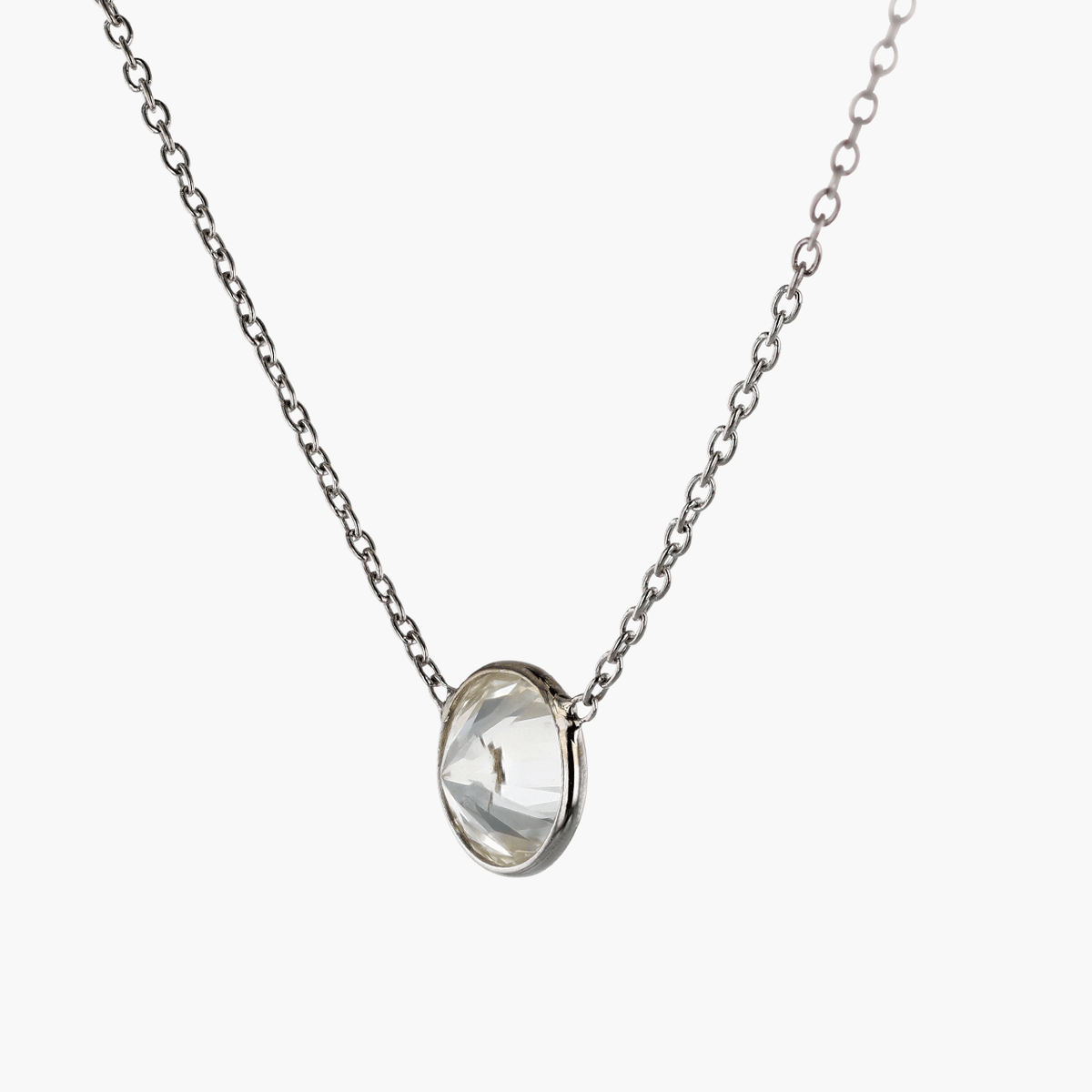 White Gold and Bezel Set Diamond Pendant
