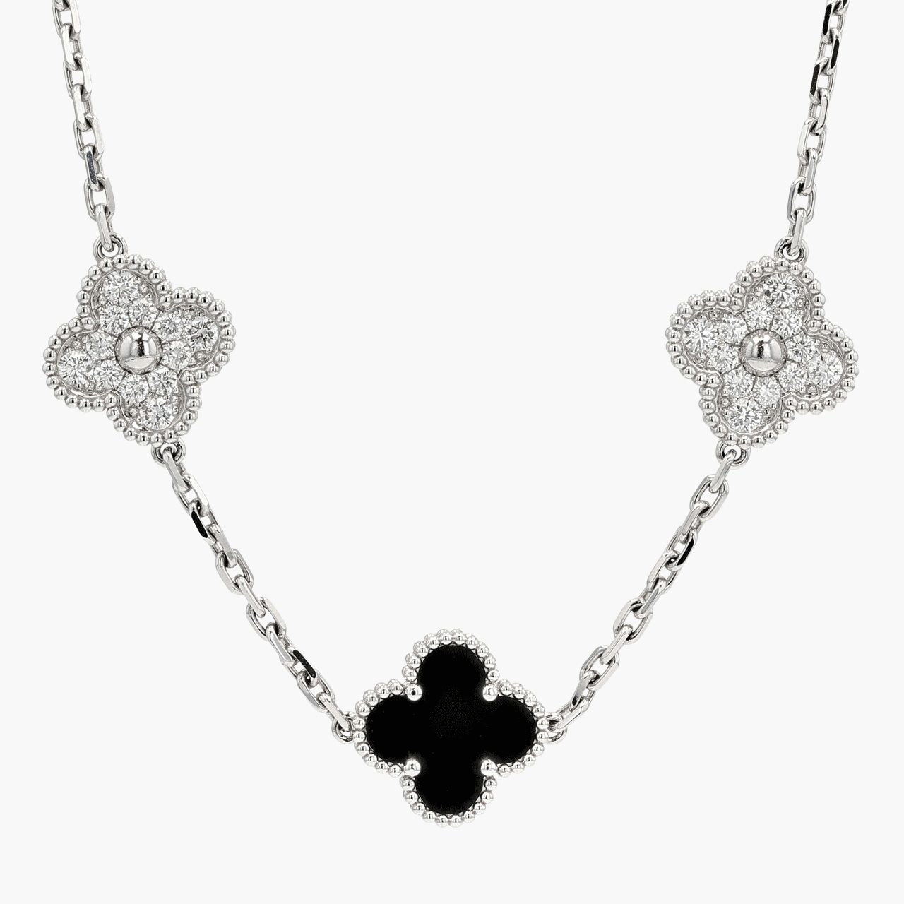 Van Cleef & Arpels White Gold, Diamond, and Onyx Alhambra 20 Motif