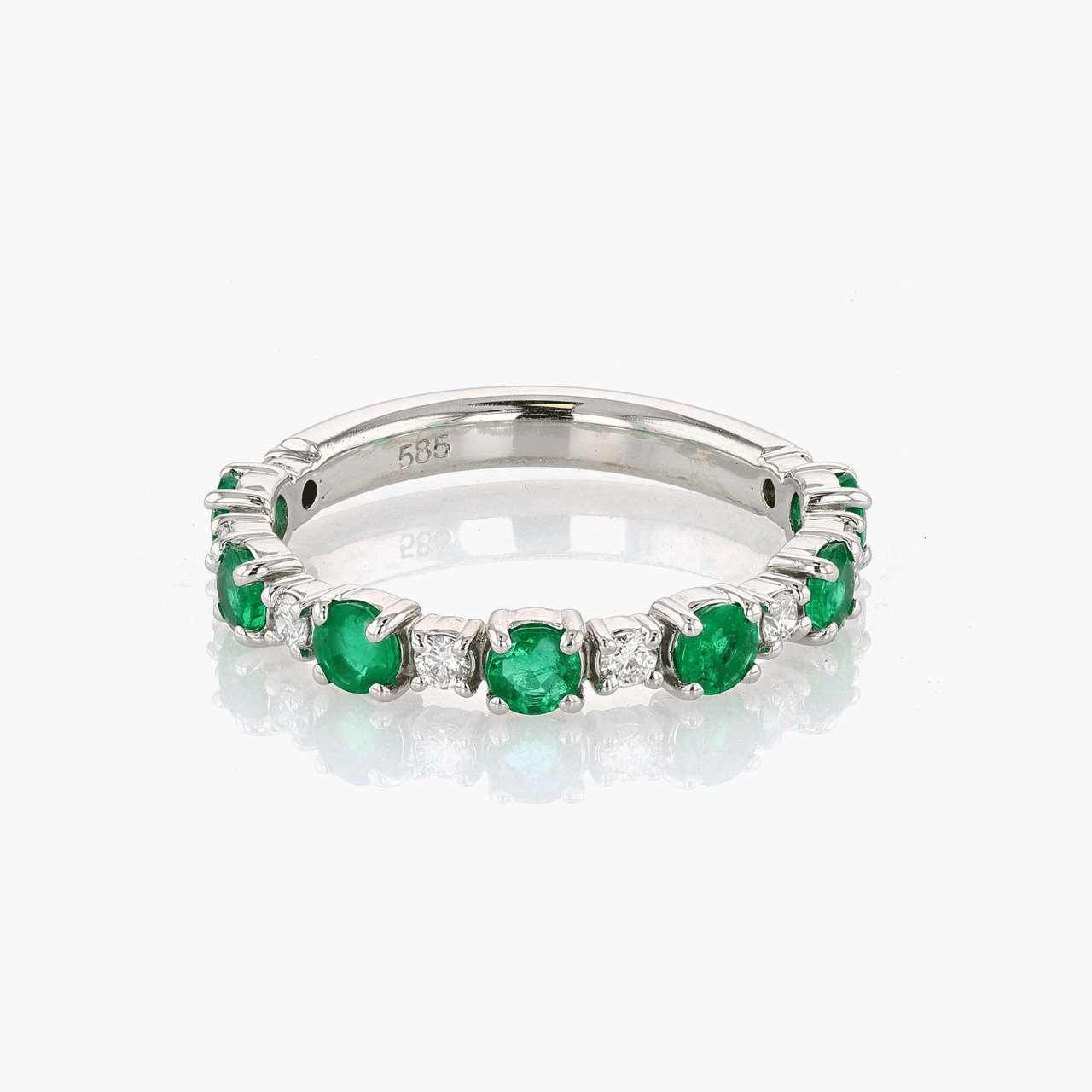 White Gold, Diamond, and Emerald Wedding Band