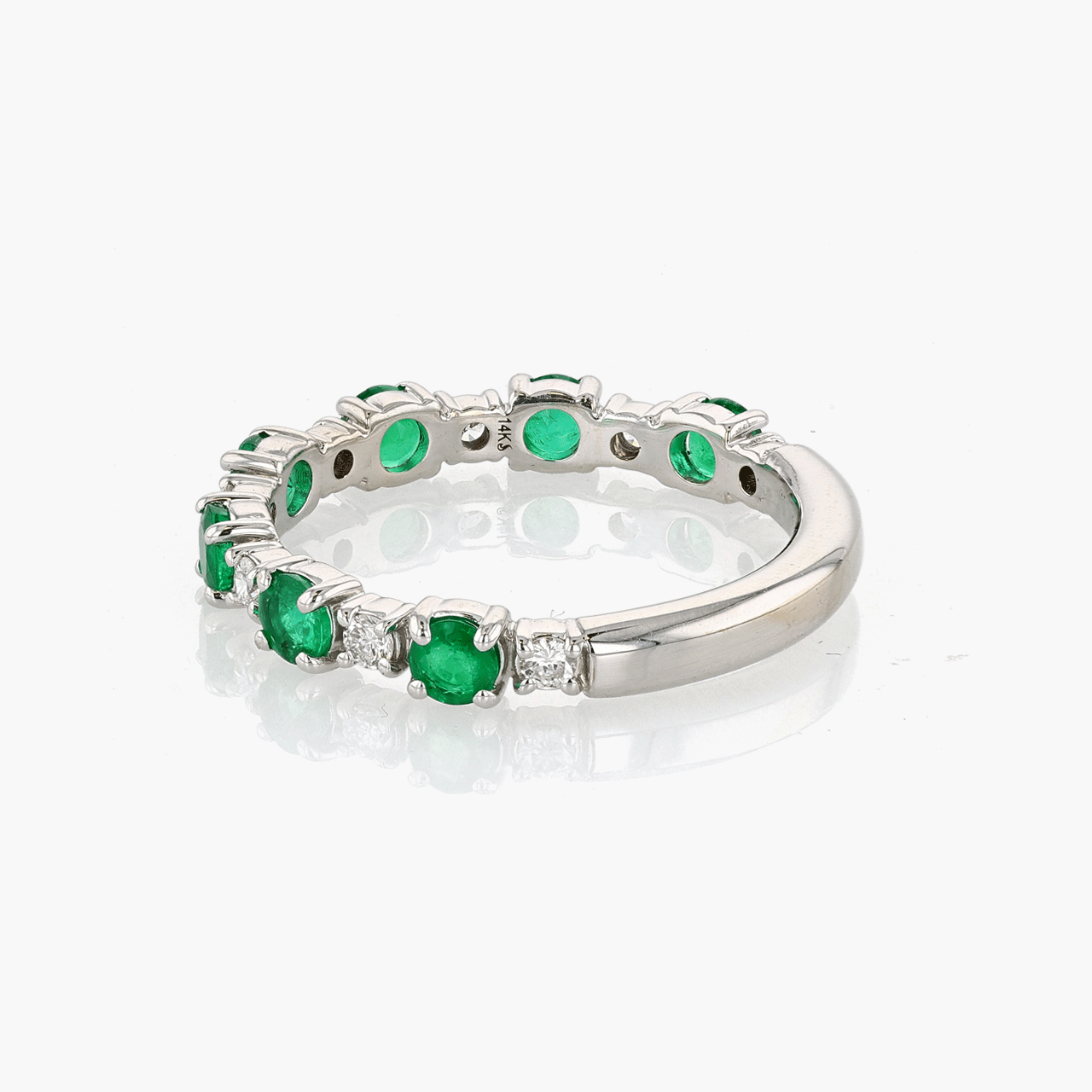 White Gold, Diamond, and Emerald Wedding Band