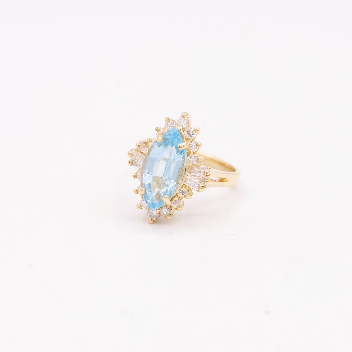 14KT Gold Blue Topaz and Diamond Ring